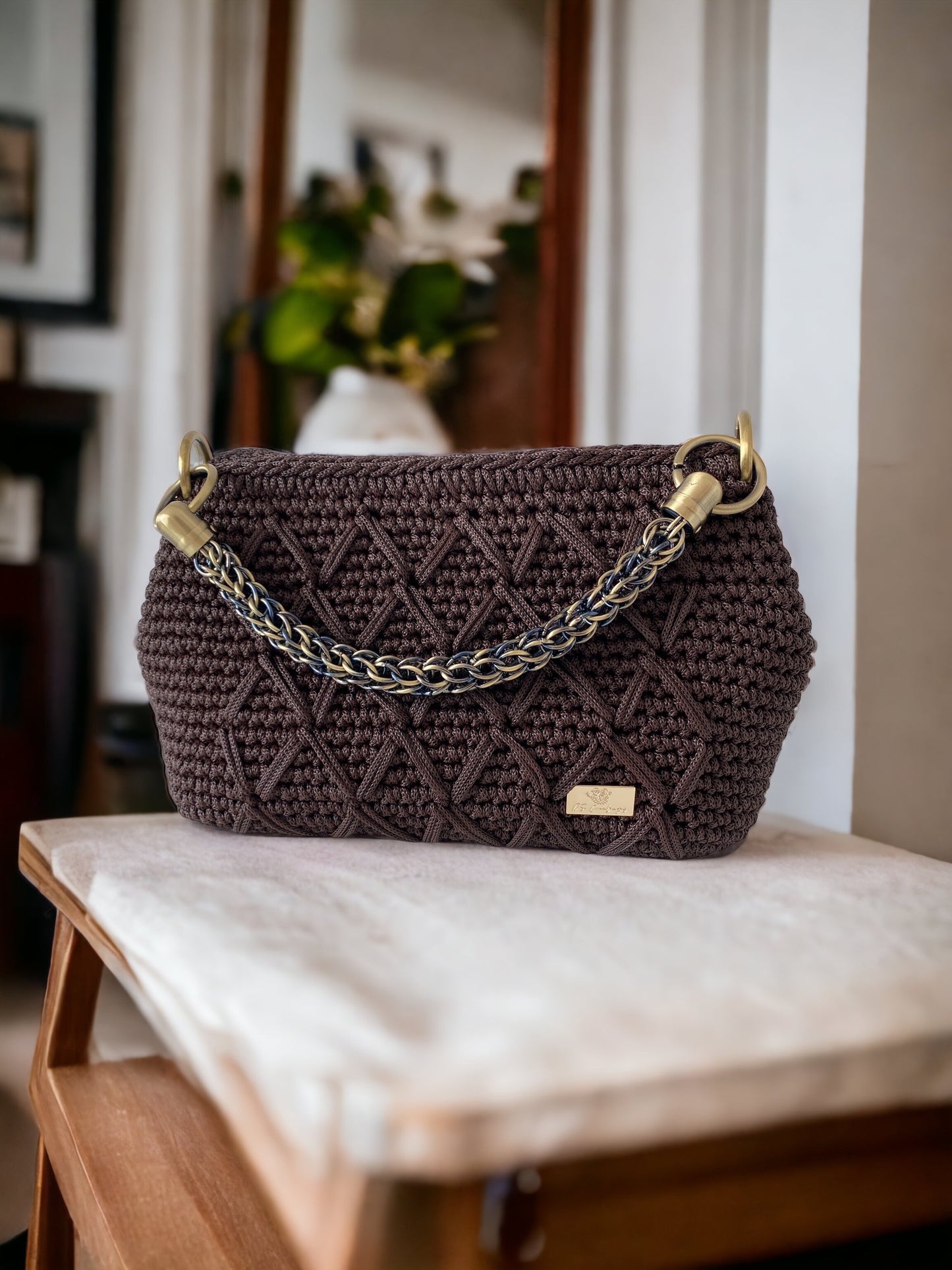 Glamorous clutch with metal chain handle