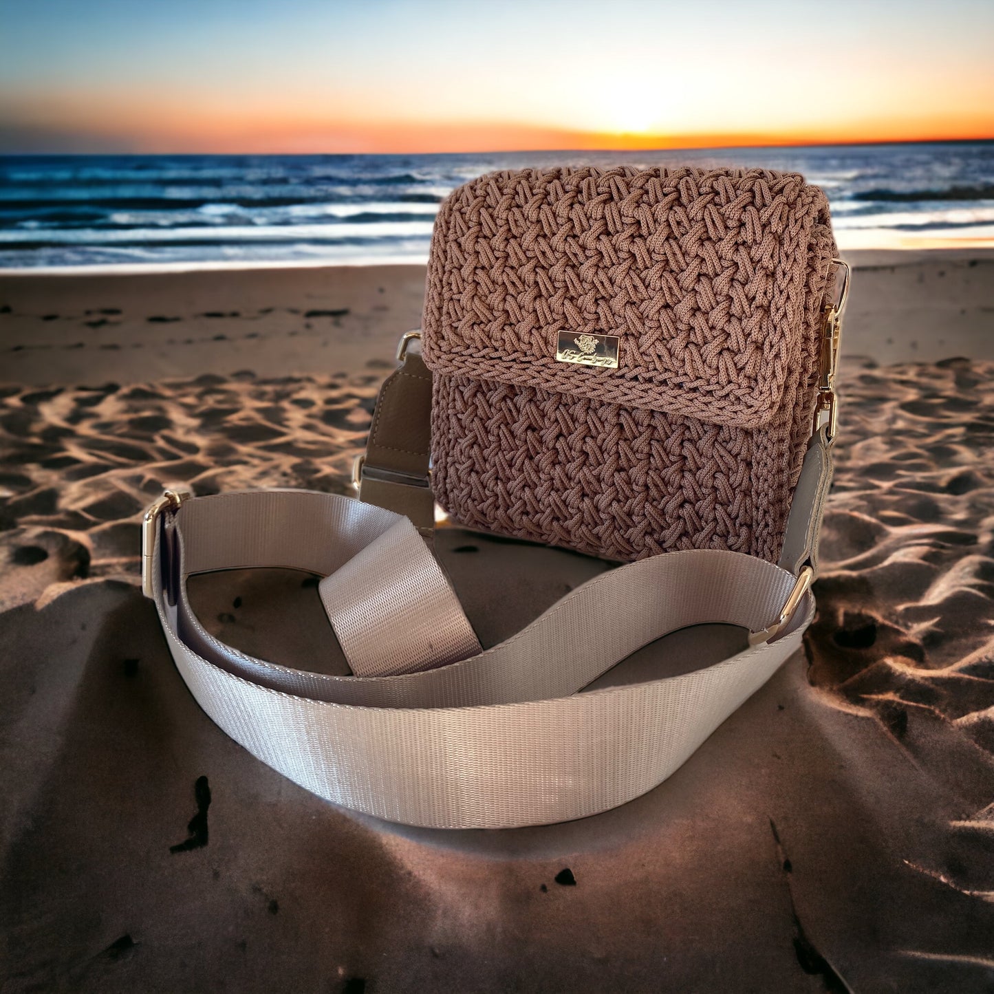 Chic mini crossbody features a relaxed fit and an adjustable long strap