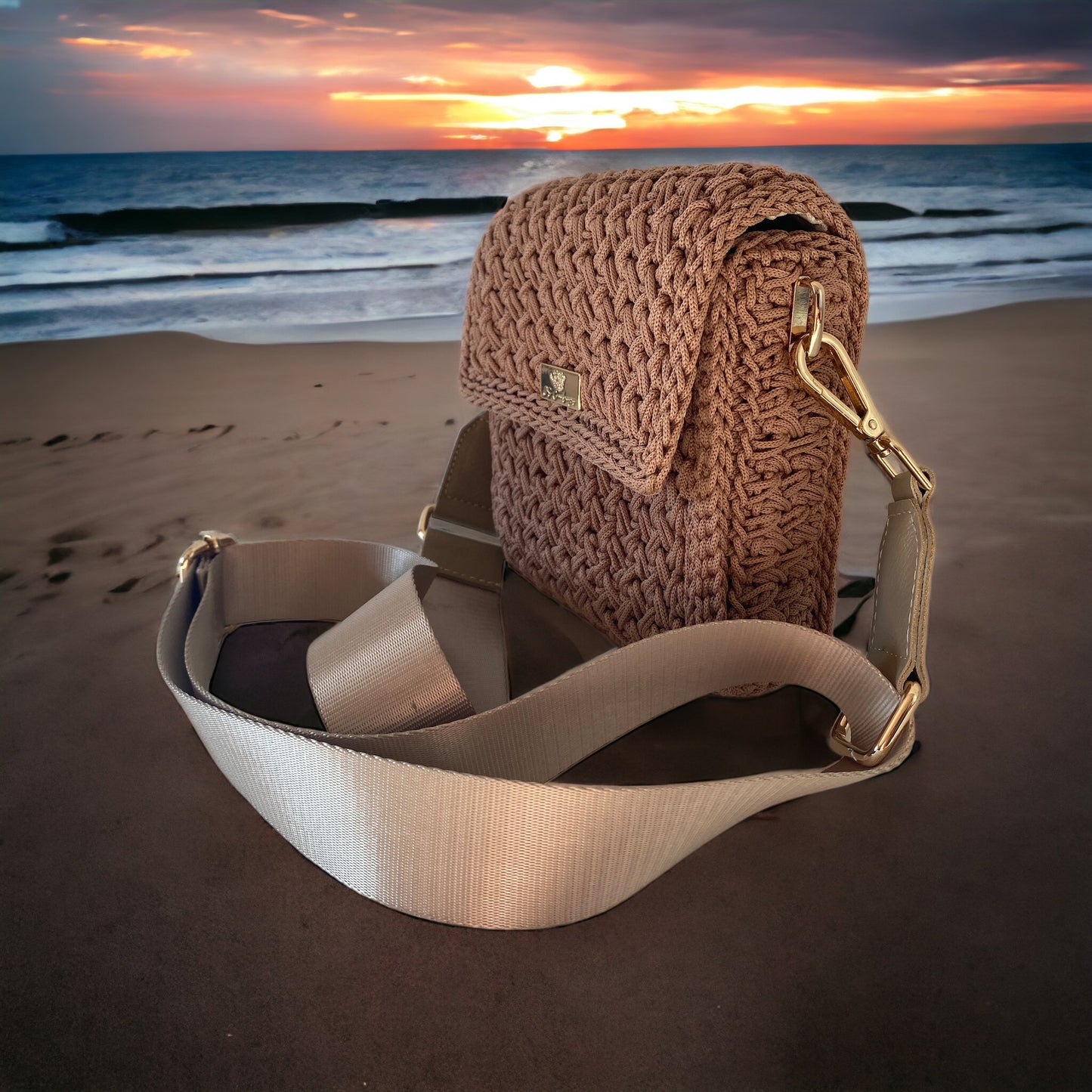 Chic mini crossbody features a relaxed fit and an adjustable long strap