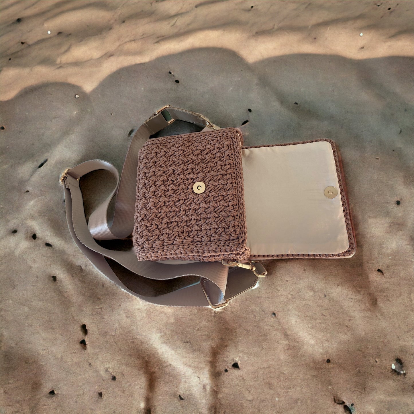 Chic mini crossbody features a relaxed fit and an adjustable long strap