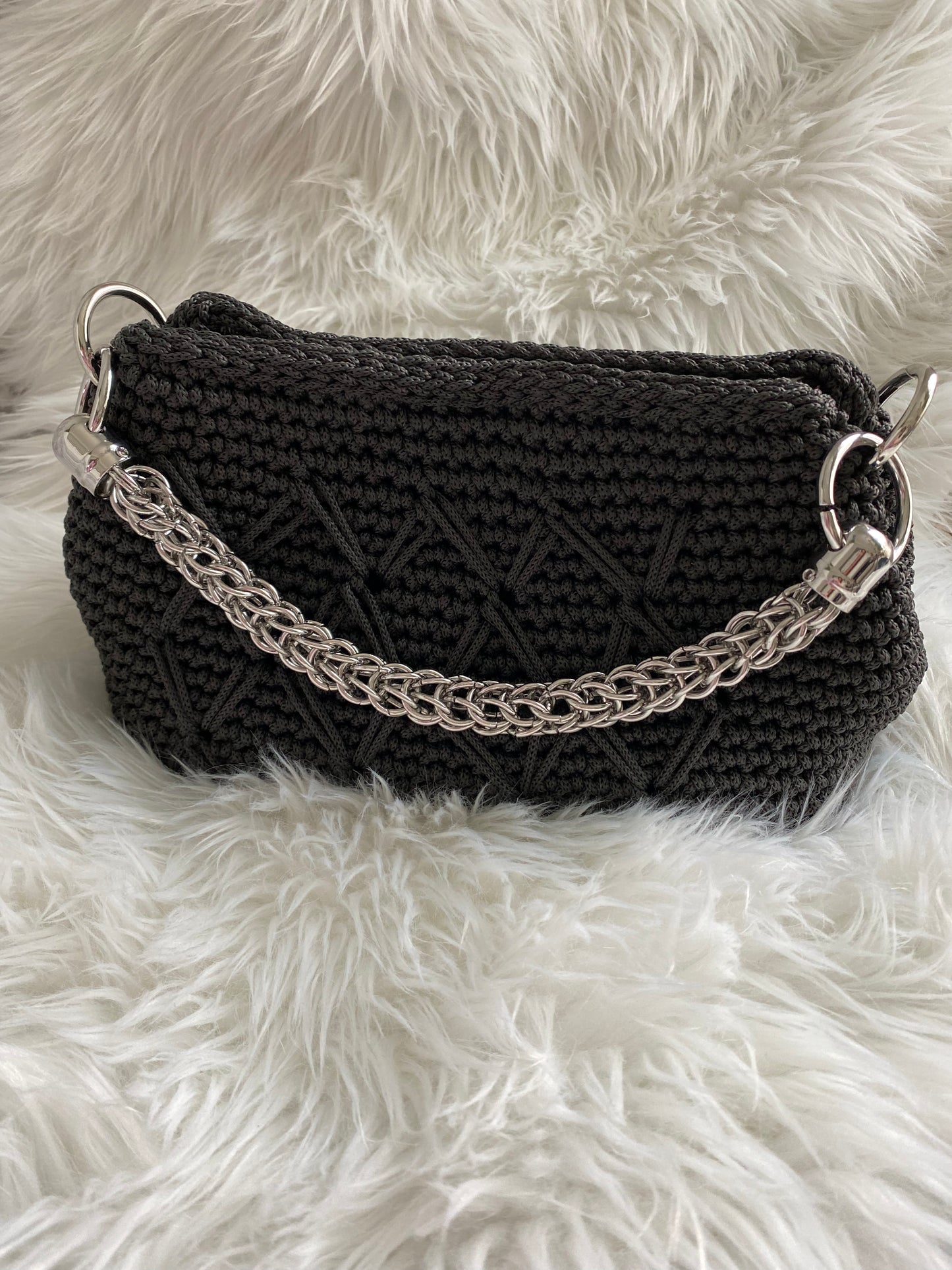 Clutch purse with glamorous handle