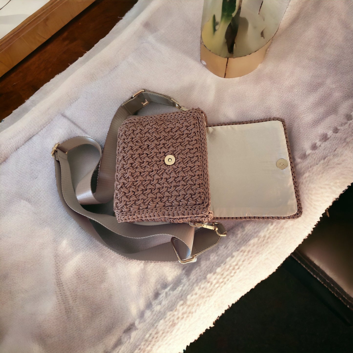 Chic mini crossbody features a relaxed fit and an adjustable long strap