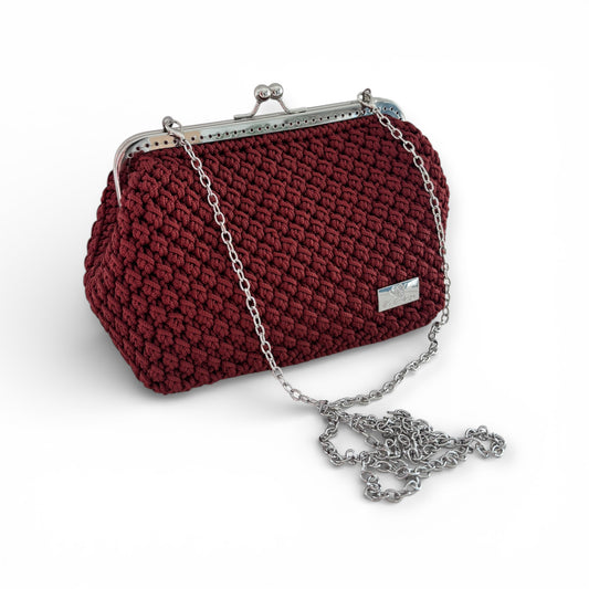 Clutch with metal frame