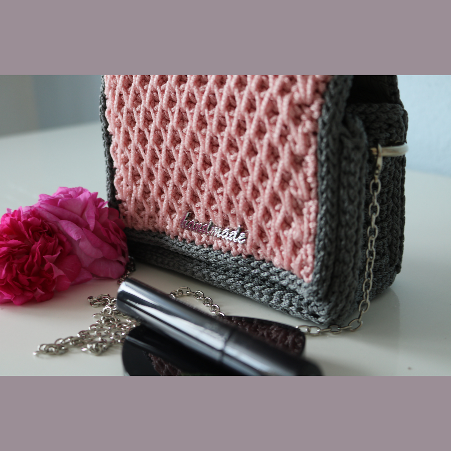 Mini soft pink colour handbag with long silver metal chain