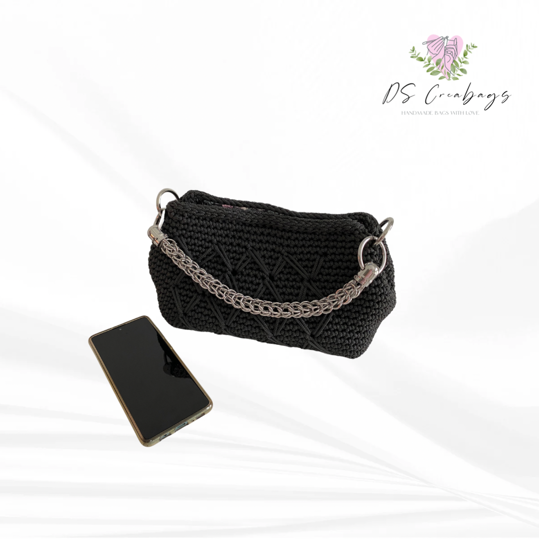 Clutch purse with glamorous handle